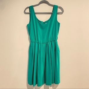 Women’s, Calvin Klein, Kelly green, pleated dress. Size 4, with pockets.